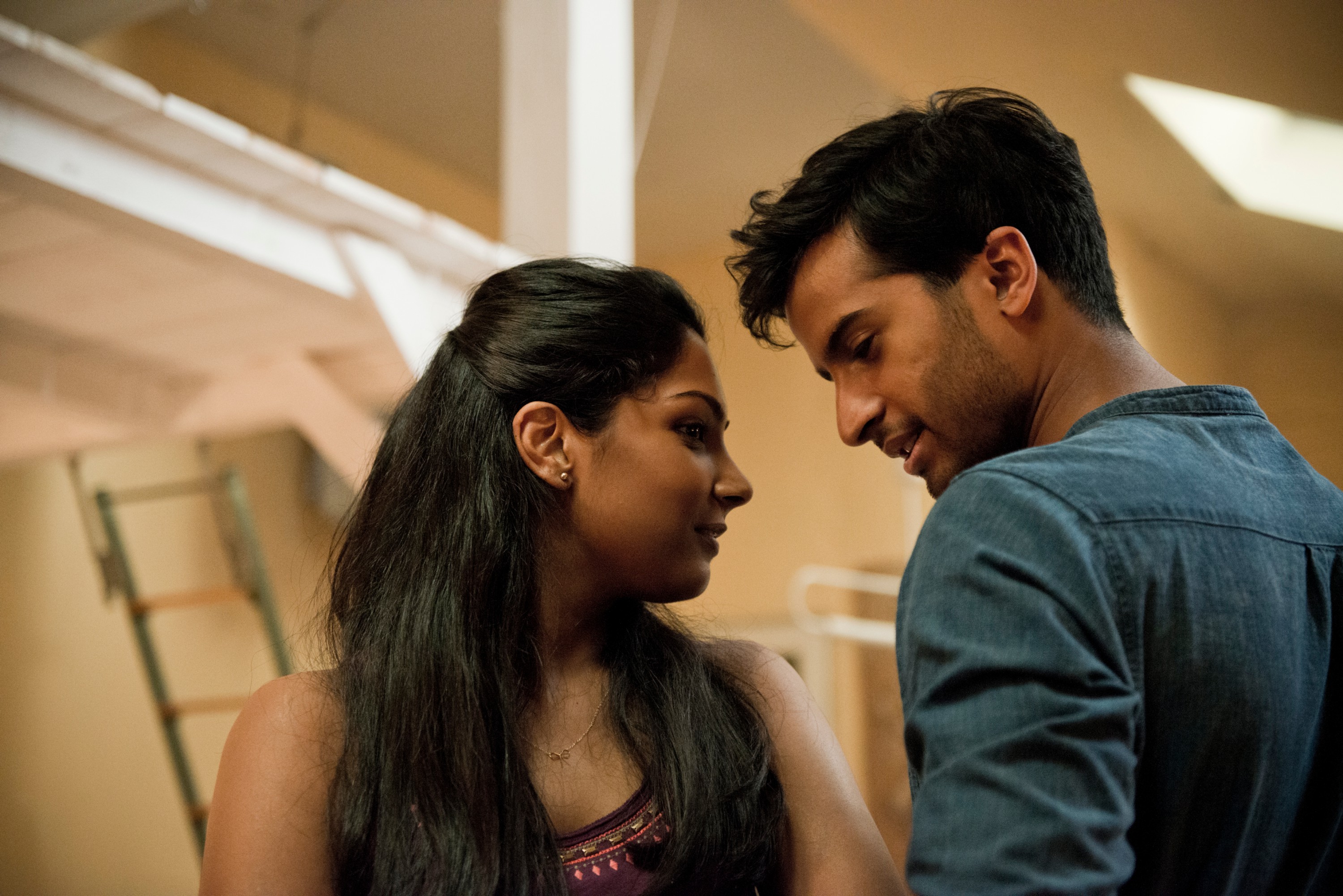 Hamza Jeetooa and Natalie Perera in Der Koch (2014)