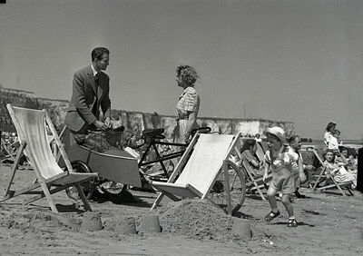 Derek Bond, Joan Hopkins and Barrie Smith (son of producer Herbert Smith)  on the beach at Cliftonville Margate, Kent, England, for "The Weaker Sex"