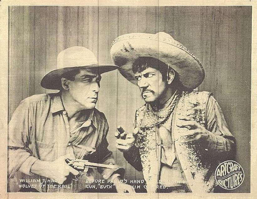 William Elmer and William S. Hart in Wolves of the Rail (1918)