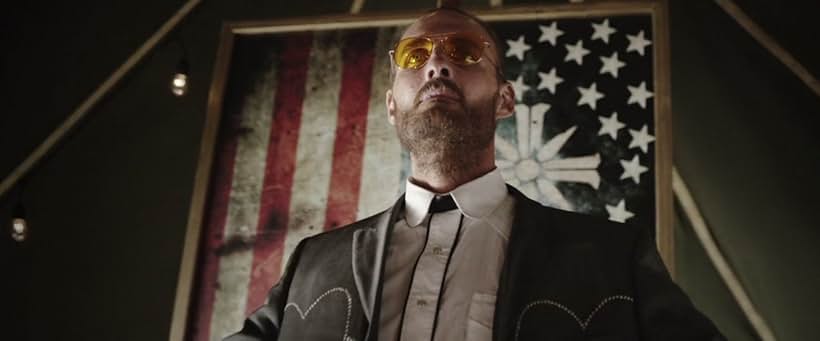 Greg Bryk in Far Cry 5: Inside Eden's Gate (2018)