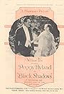 Peggy Hyland and Alan Roscoe in Black Shadows (1920)