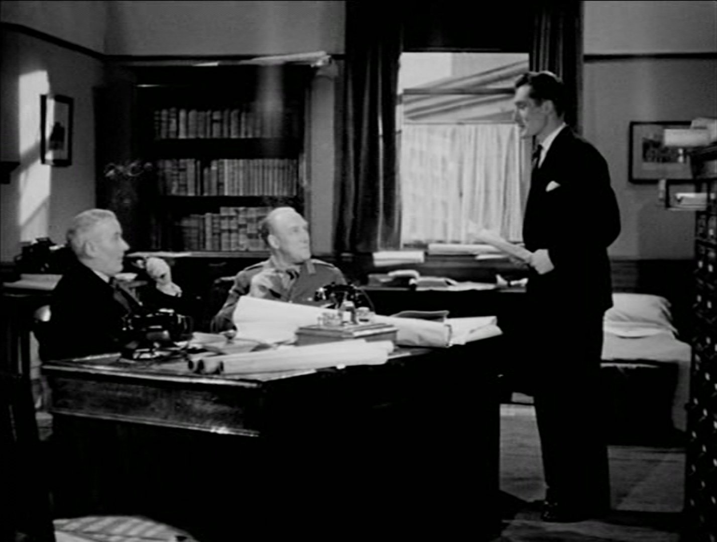 Ian Fleming, Patrick Holt, and Milton Rosmer in Dangerous Comment (1940)