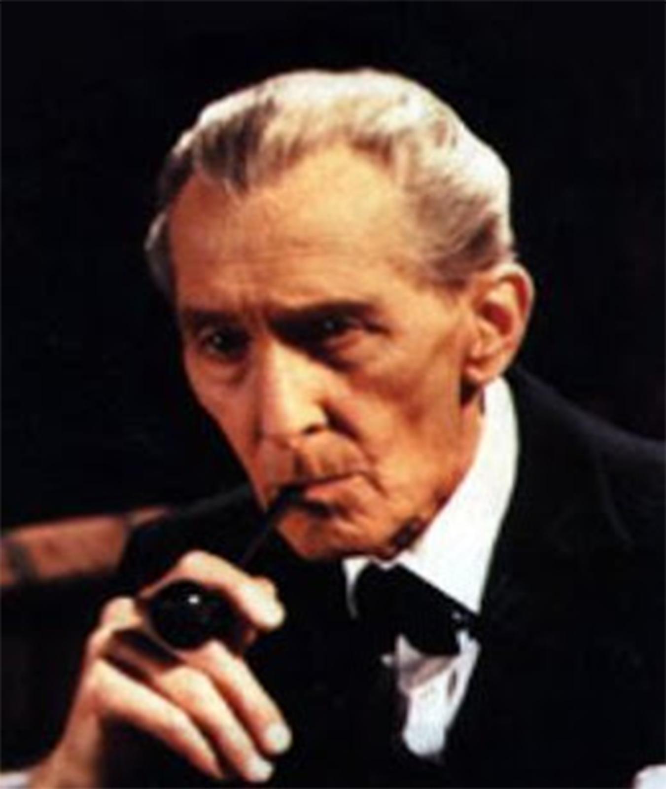 Peter Cushing in Sherlock Holmes and the Masks of Death (1984)