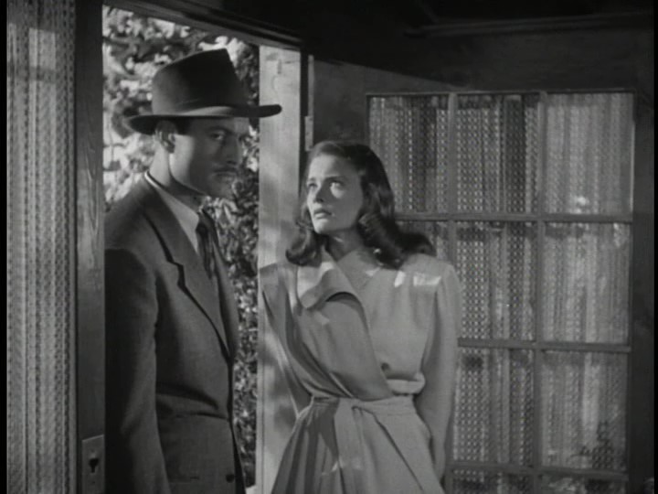 Nancy Guild and George Montgomery in The Brasher Doubloon (1947)