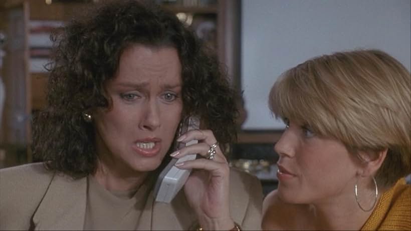 Veronica Hamel and Loryn Locklin in Taking Care of Business (1990)