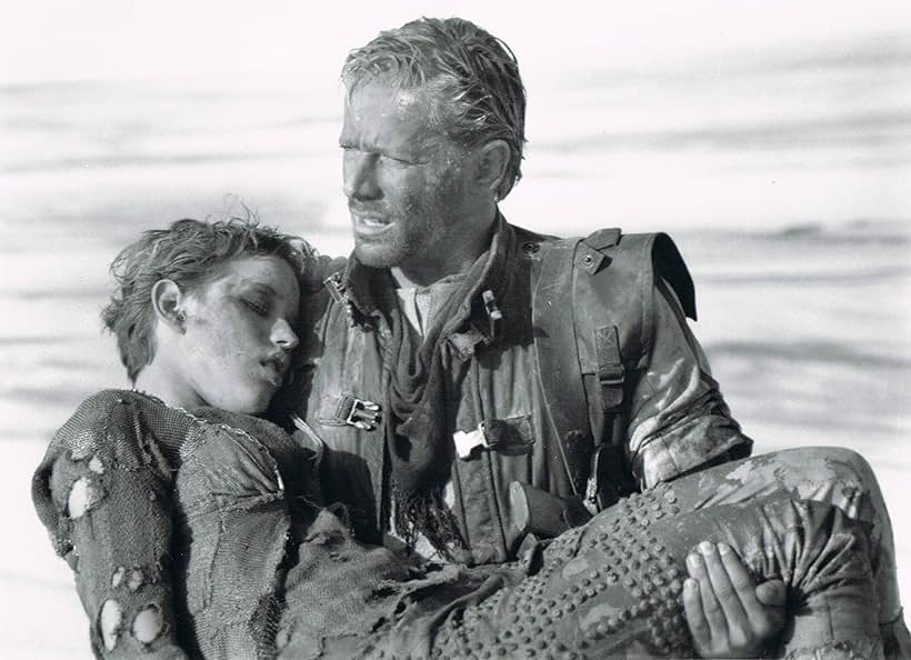 Molly Ringwald and Peter Strauss in Spacehunter: Adventures in the Forbidden Zone (1983)