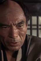 Yoshio Yoshida in Zatoichi on the Road (1963)