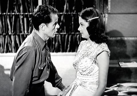 Elisha Cook Jr. and Jane Greer in The Falcon's Alibi (1946)