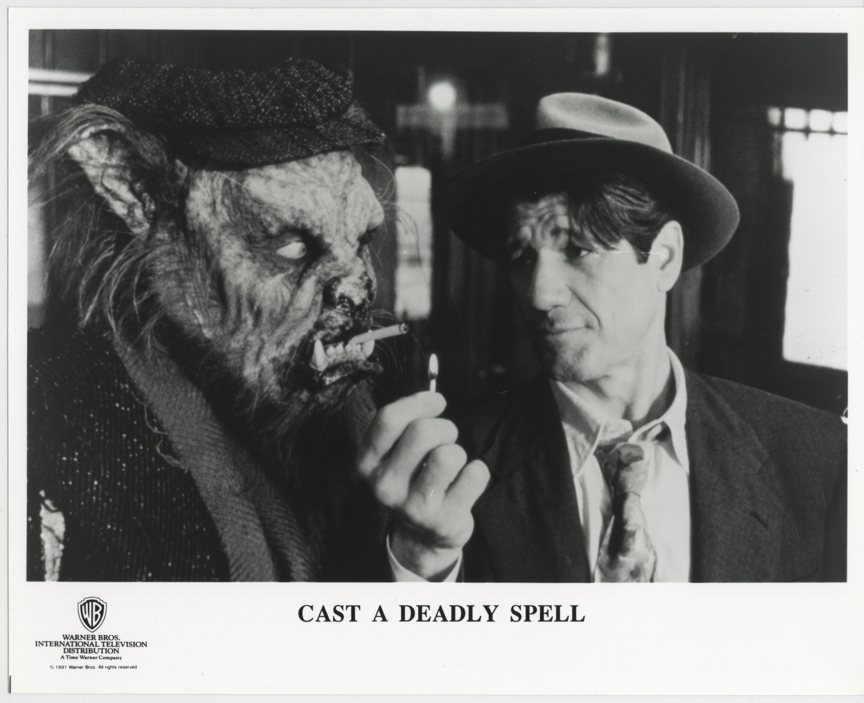 James Eustermann and Fred Ward in Cast a Deadly Spell (1991)