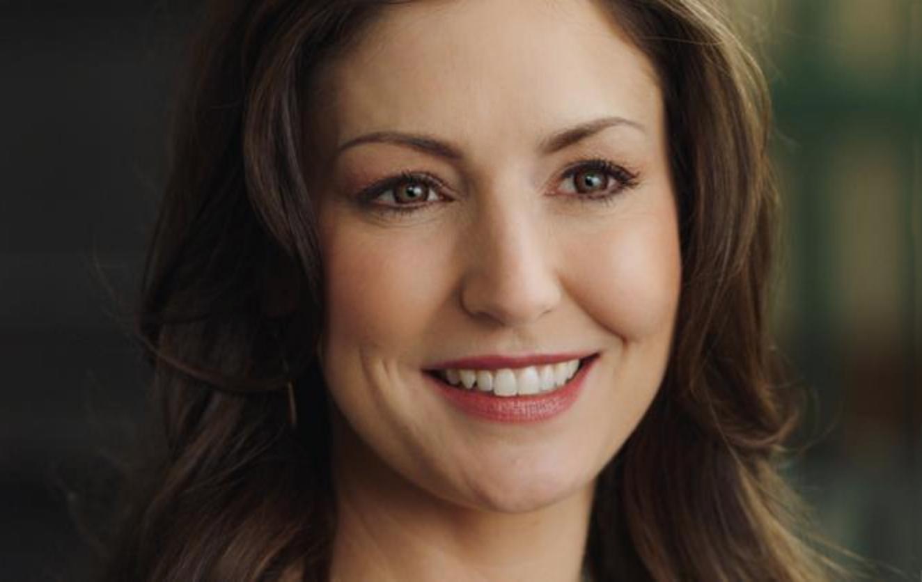 Nicole DuPort as Amy Grant