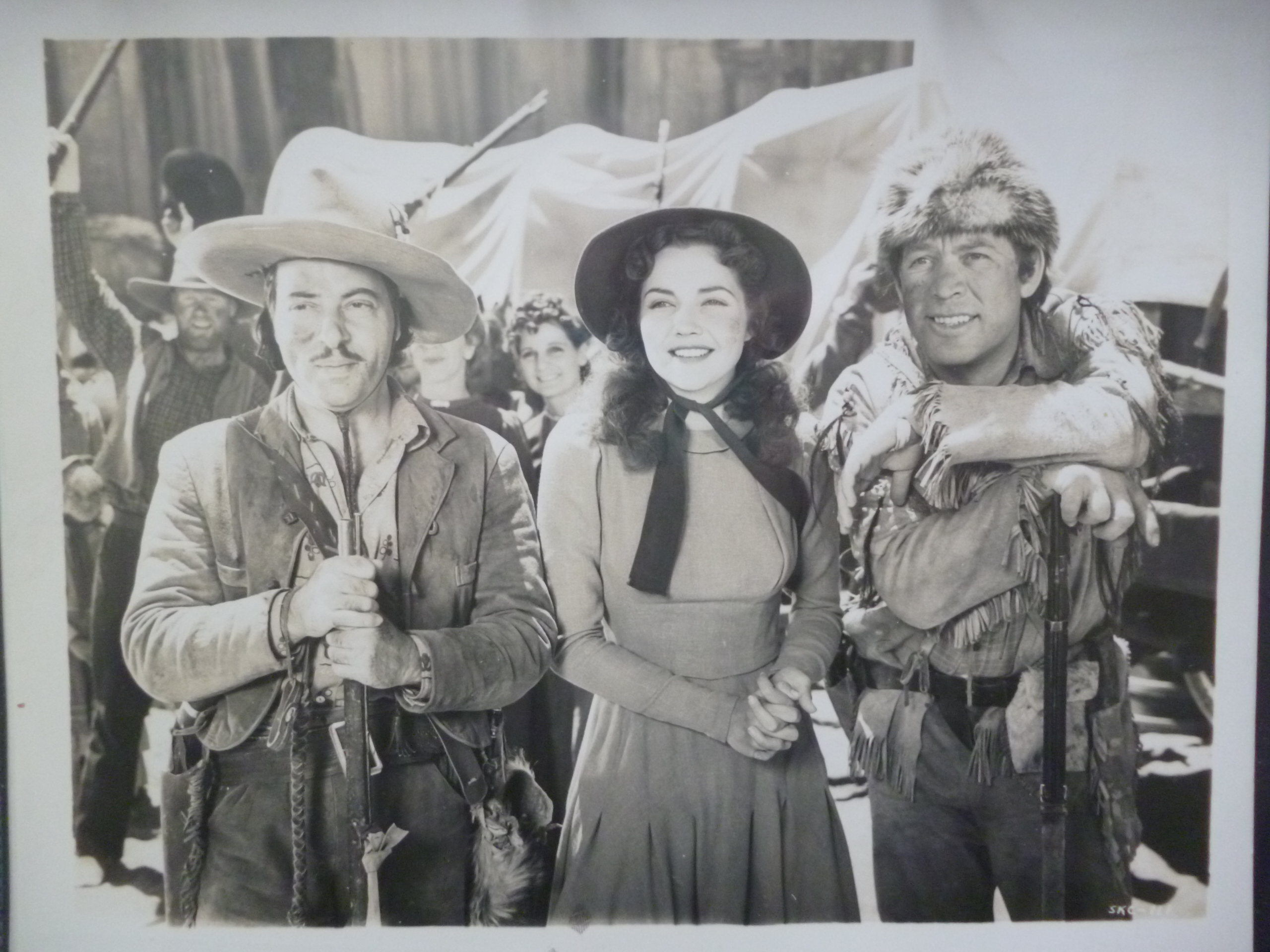 Ward Bond, Lynn Bari, and Harold Huber in Kit Carson (1940)