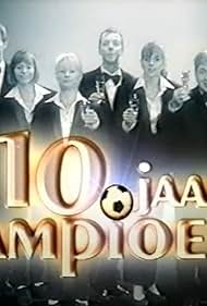 Marijn De Valck, Loes van den Heuvel, Danni Heylen, Ben Rottiers, An Swartenbroekx, Ann Tuts, Herman Verbruggen, and Johny Voners in 10 jaar kampioen (1999)