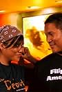 Melanie (Joy Bisco) and Patricio (Dante Basco) as movie promoters in THE JOURNEY (2010).