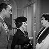 Claudette Colbert, Rochelle Hudson, and Warren William in Imitation of Life (1934)