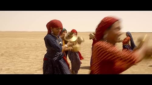 A group of suppressed women from a village in Gujarat find someone in the desert and their lives are changed forever.