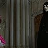 Natalie Portman, John Standing, and Hugo Weaving in V for Vendetta (2005)