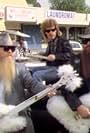 Frank Beard, Billy Gibbons, Dusty Hill, and ZZ Top in ZZ Top: Legs (1984)