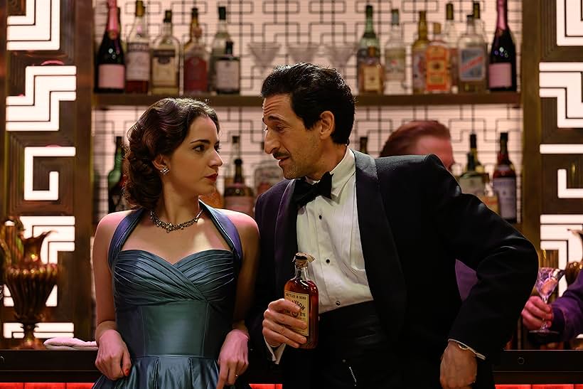 Adrien Brody and Pearl Chanda in See How They Run (2022)