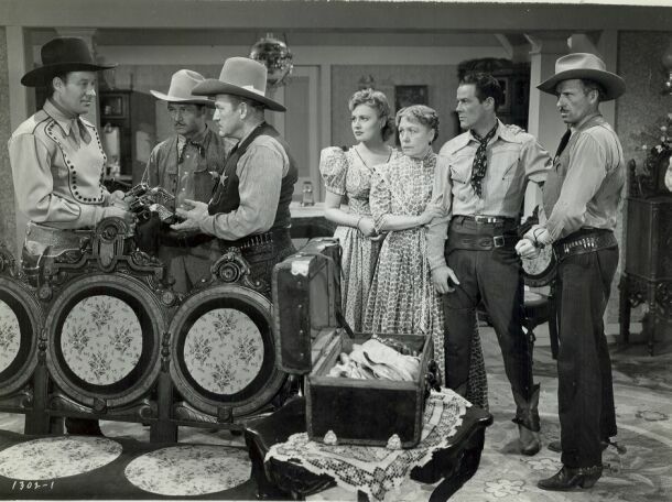 Roy Brent, Georgie Cooper, Bill Elliott, John James, Anne Jeffreys, Jack Rockwell, and Al Taylor in The Man from Thunder River (1943)