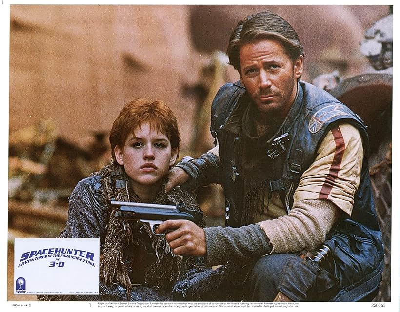 Molly Ringwald and Peter Strauss in Spacehunter: Adventures in the Forbidden Zone (1983)