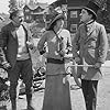 Charles Chaplin, Harry McCoy, and Mabel Normand in Mabel at the Wheel (1914)