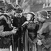 Olivia de Havilland, Alan Hale, Patric Knowles, and Eugene Pallette in The Adventures of Robin Hood (1938)