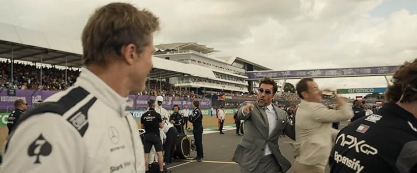 Brad Pitt, Javier Bardem, and Tobias Menzies in F1 (2025)