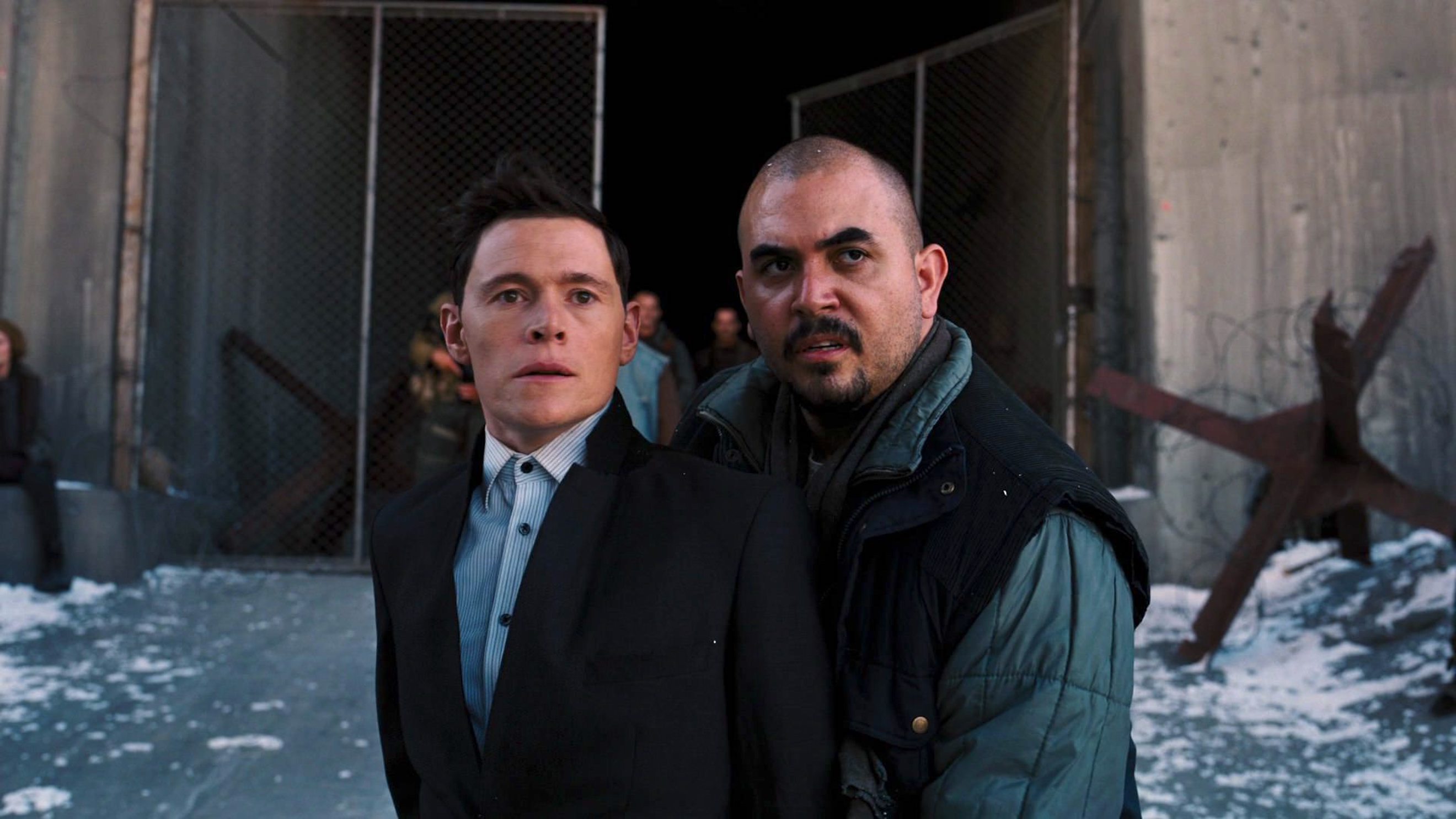 Noel Gugliemi and Burn Gorman in The Dark Knight Rises (2012)