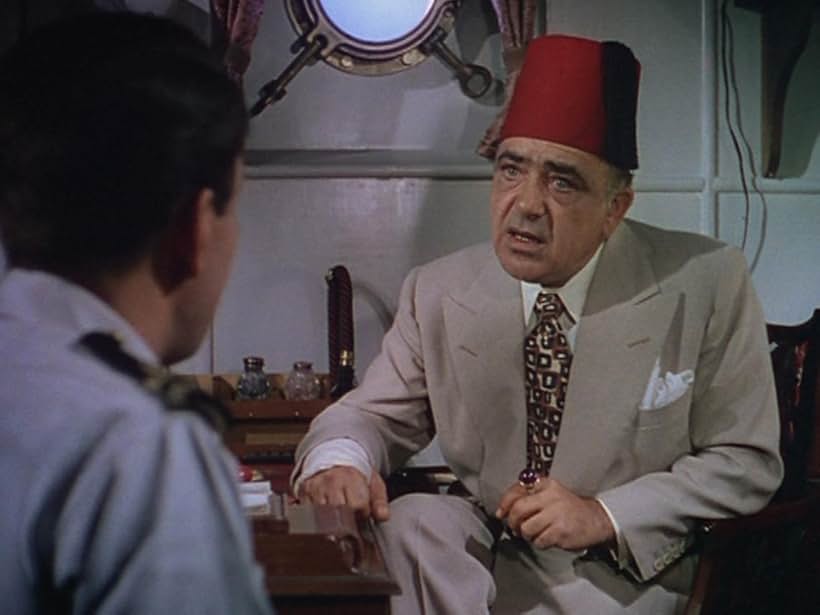 Akim Tamiroff in You Know What Sailors Are (1954)