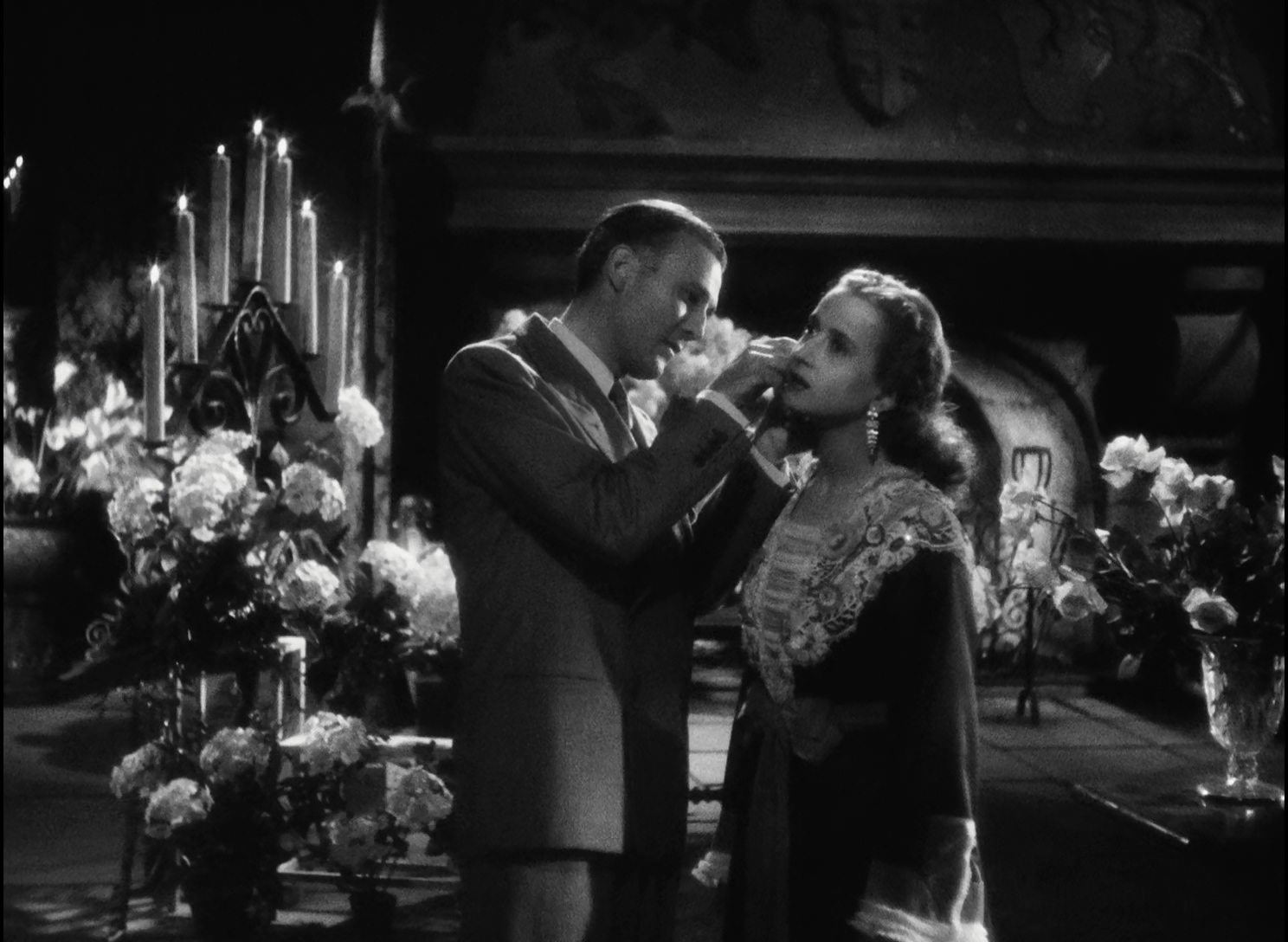 Renée Faure and Raymond Rouleau in Who Killed Santa Claus? (1941)