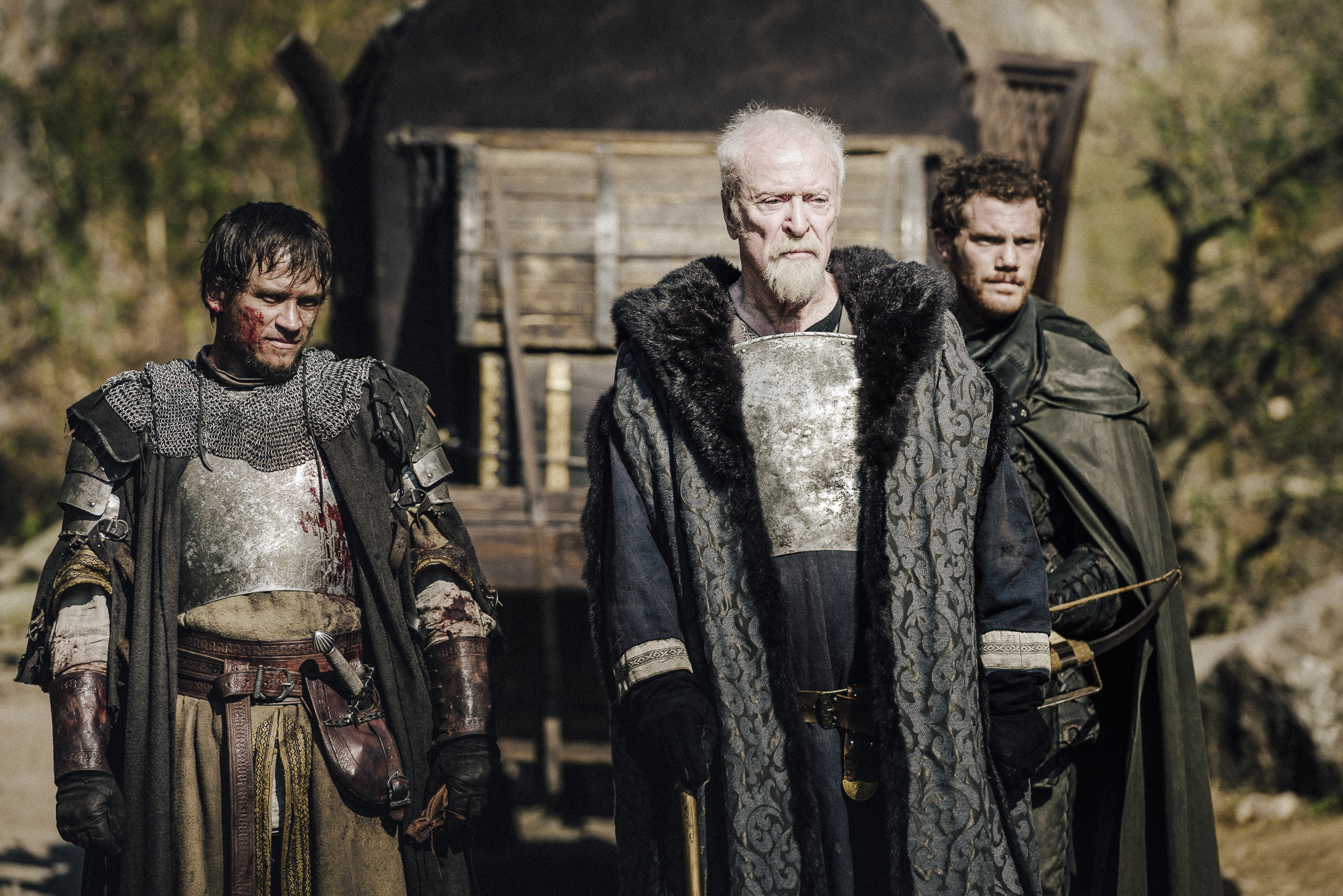 Still of Michael Caine, Alistair Brammer and Vincenz Kiefer in Medieval (2022)