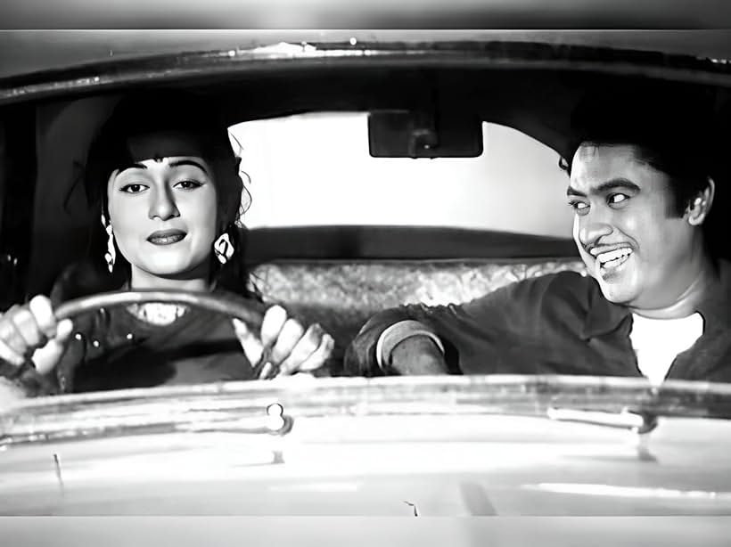 Kishore Kumar and Madhubala in Chalti Ka Naam Gaadi (1958)