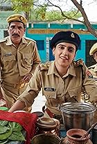 Shashi Ranjan, Govind Pandey, Neha Saraf, and Sanya Malhotra in Kathal: A Jackfruit Mystery (2023)