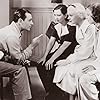 Alice Faye, Patsy Kelly, Frances Langford, and George Raft in Every Night at Eight (1935)