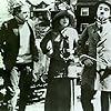 Charles Chaplin, Harry McCoy, and Mabel Normand in Mabel at the Wheel (1914)