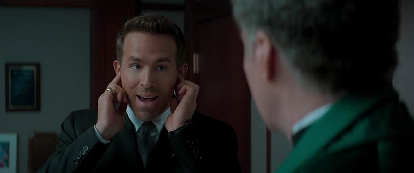 Will Ferrell and Ryan Reynolds in Spirited (2022)