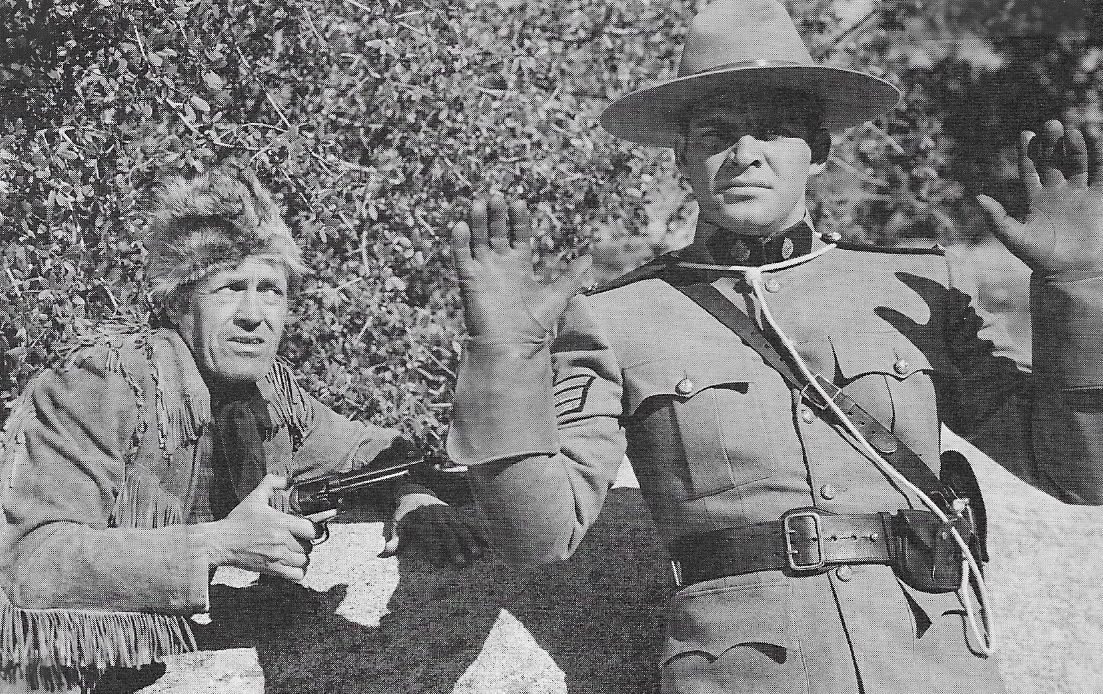 George Chesebro and Robert Kellard in Perils of the Royal Mounted (1942)