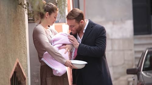 Kerem Bürsin and Burcu Biricik in Matter of Respect (2014)