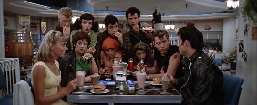 John Travolta, Stockard Channing, Olivia Newton-John, Jeff Conaway, Dinah Manoff, Didi Conn, Jamie Donnelly, Barry Pearl, Michael Tucci, and Kelly Ward in Grease (1978)