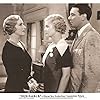 George Brent, Virginia Hammond, and Jean Muir in Desirable (1934)