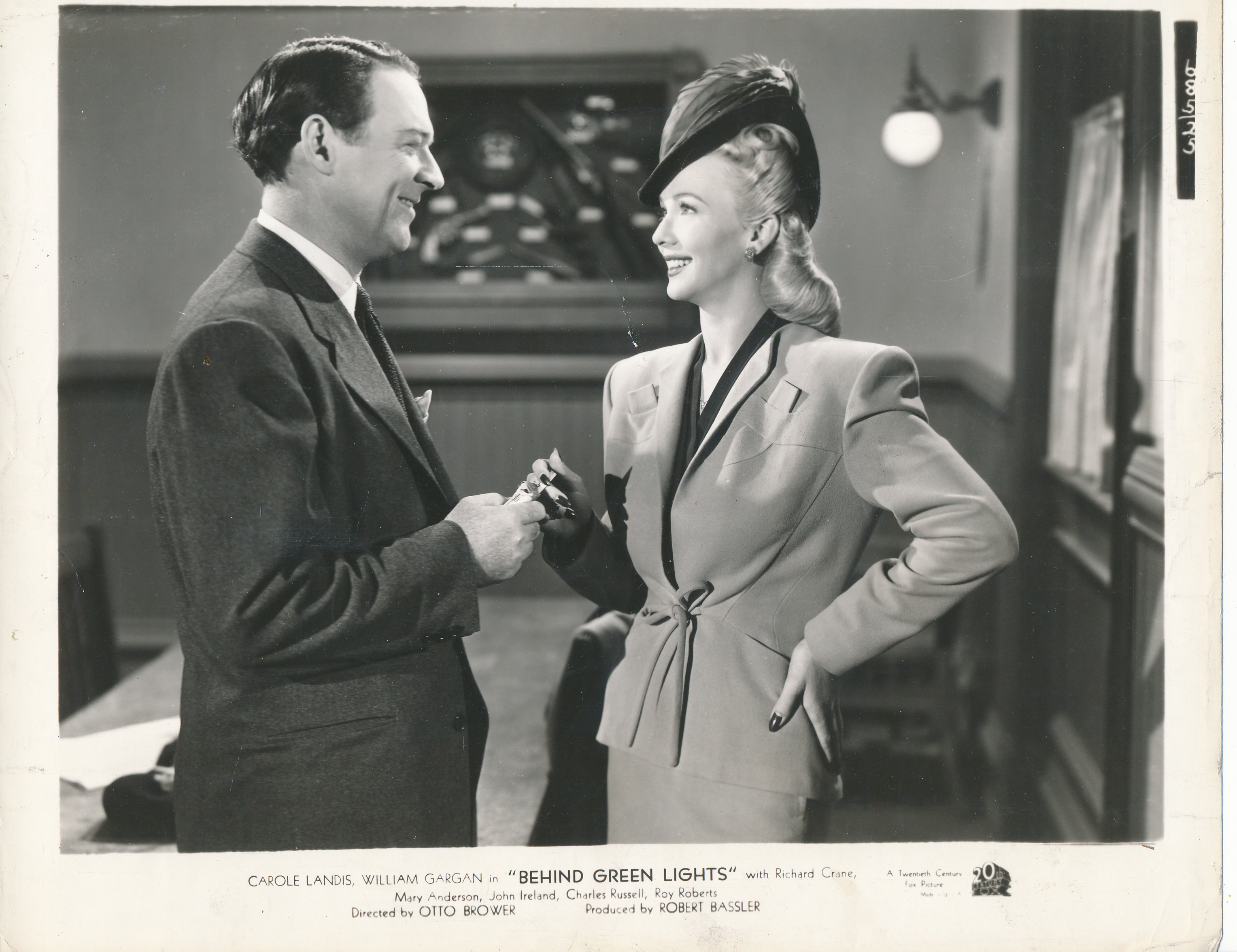 William Gargan and Carole Landis in Behind Green Lights (1946)