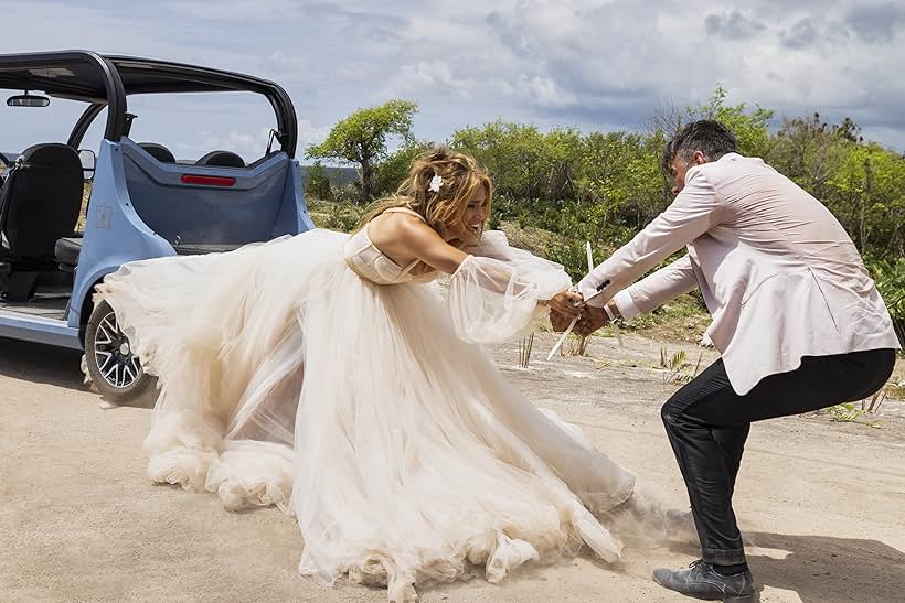 Jennifer Lopez and Josh Duhamel in Shotgun Wedding (2022)