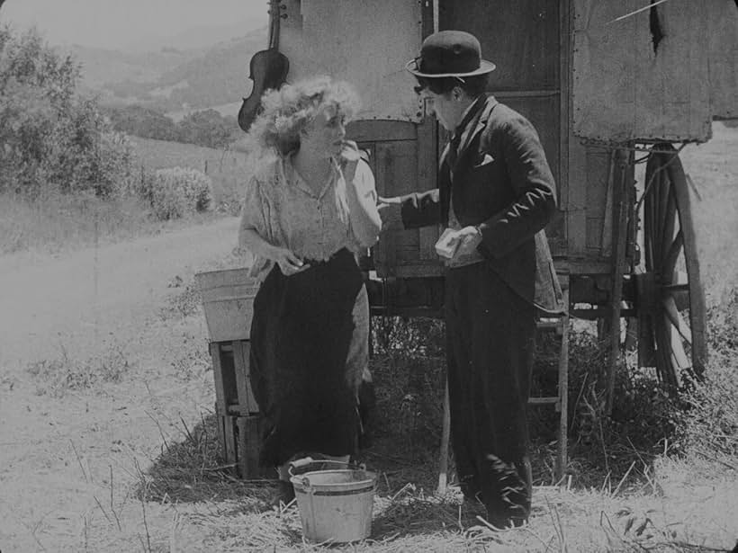 Charles Chaplin and Edna Purviance in The Vagabond (1916)