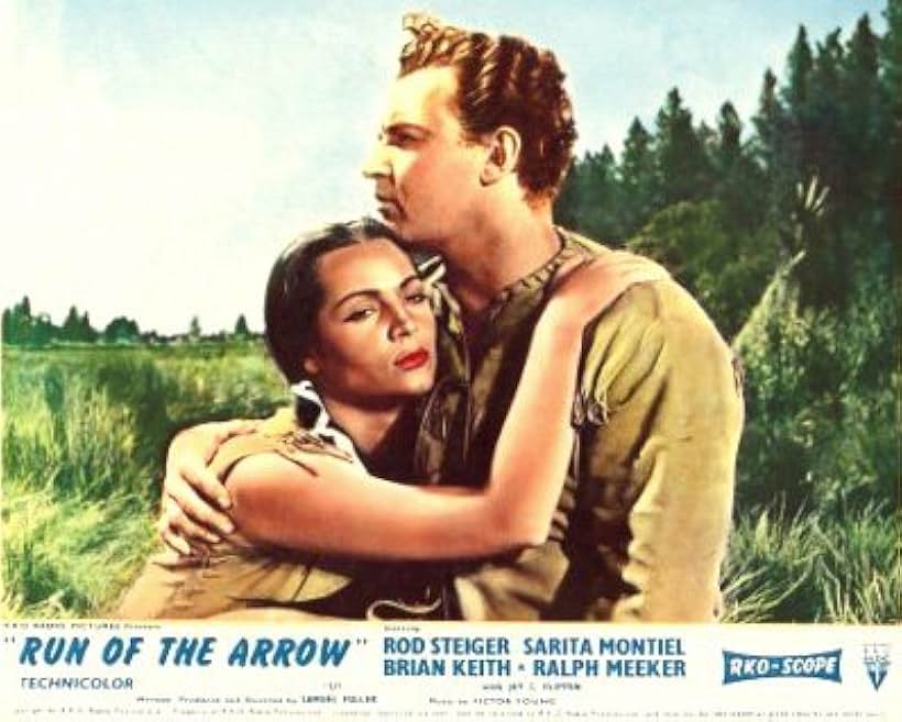 Rod Steiger and Sara Montiel in Run of the Arrow (1957)