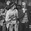 Charles Chaplin, Albert Austin, and Leo White in Behind the Screen (1916)