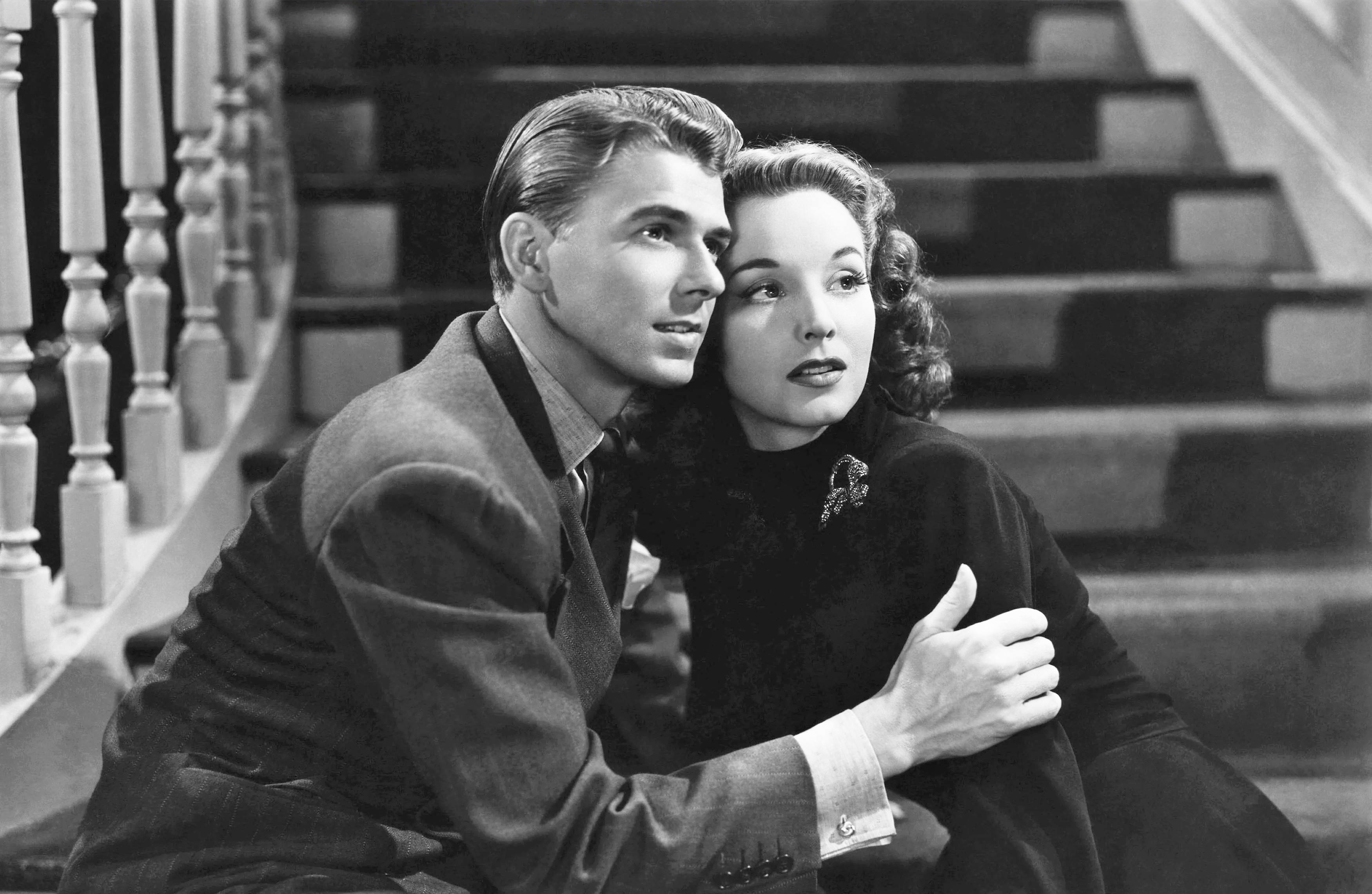 Ronald Reagan and Joan Perry in Nine Lives Are Not Enough (1941)