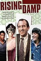 Richard Beckinsale, Frances de la Tour, Leonard Rossiter, and Don Warrington in Rising Damp (1974)