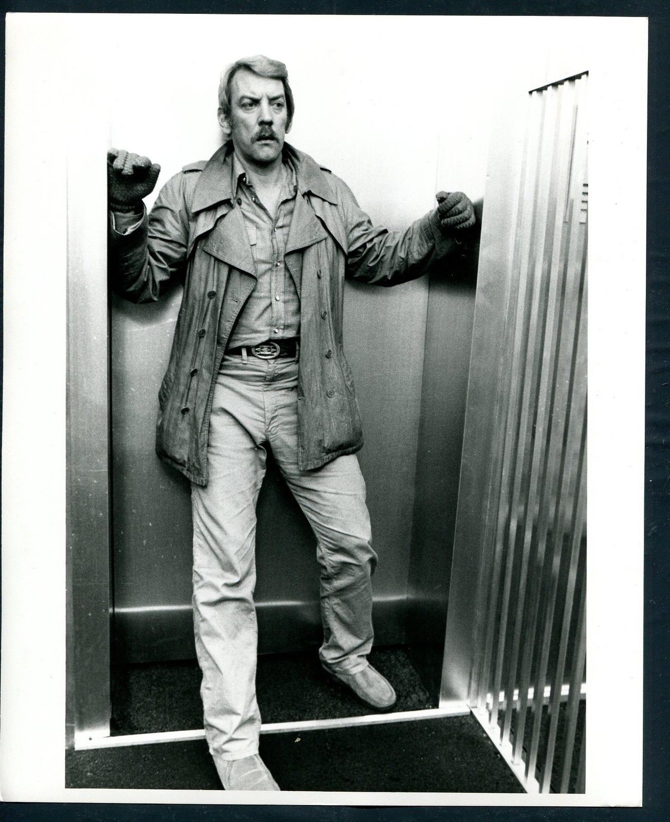 Donald Sutherland in A Man, a Woman and a Bank (1979)