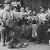 Charles Chaplin, Albert Austin, Eric Campbell, and Leo White in Behind the Screen (1916)