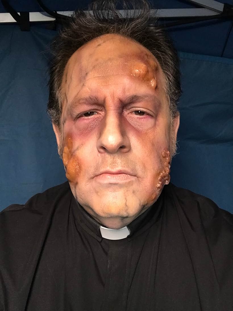 Roger Rignack as Father Mike turn zombie in Witness Infection